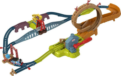 the Thomas &amp; Friends Launch &amp; Loop Maintenance Yard train set, featuring illustrations of Thomas the Train and his friends, as well as the train set itself with tracks and train cars. Available at Kaya kids